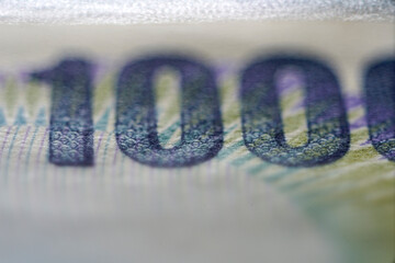 Close-Up Macro View of a Thousand Dollar Note Denomination Detail