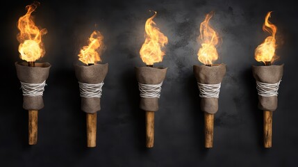 Three burning torches with bright flames attached to a textured wall creating a warm glow