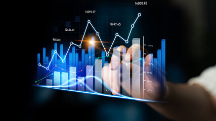 A close-up of a hand interacting with a digital screen displaying financial graphs and data visualizations, emphasizing business growth and market trends. Scalp