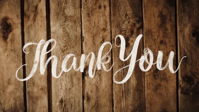 Sincere 'Thank You' calligraphy script elegantly presented on a beautiful vintage distressed wood background