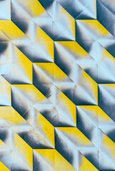 Folded spray painted colorful paper art, Japanese origami background texture, abstract geometric pattern artwork