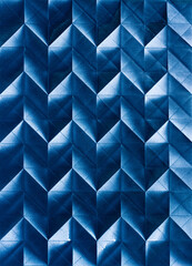 Folded spray painted colorful paper art, Japanese origami background texture, abstract geometric pattern artwork