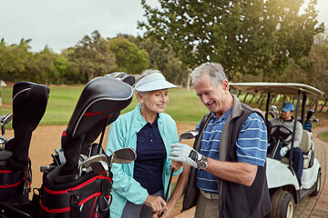Obraz premium Smile, senior couple and golf outdoor for fitness, match preparation and recreational sports. Elderly people, helping and equipment for retirement hobby, tournament game and activity at country club
