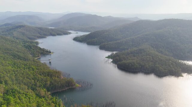 Aerial View of Mountain Reservoir and Forested Hinterland