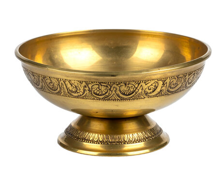 Ornate brass pedestal bowl with detailed carvings