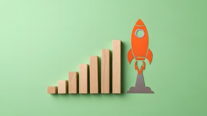 A vibrant orange toy rocket launching near a rising wooden bar graph on a mint green background symbolizing growth and success