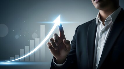 Businessman interacting with a growing graph symbolizing success and growth in finance and technology