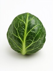 Fototapeta premium Single green brussel sprout with visible veins, sitting on a white surface