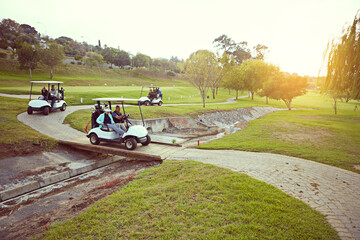 People, cart and drive on golf course for game, group hobby or travel on estate. Country club, members or vehicle on path for membership benefits, friendly tournament or canal crossing in countryside