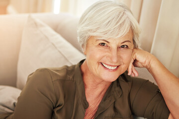 Senior woman, portrait and relax in home with smile, comfort and security in retirement. Elderly...