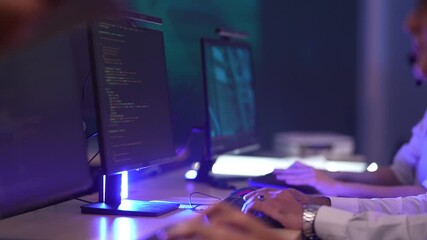 Professional technical support team managing customer service in a high-tech data center. Operators handling client communications and troubleshooting issues using digital interfaces during a night sh - Powered by Adobe