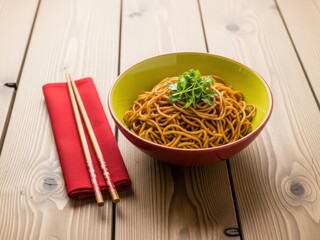Delicious noodles served in a bowl with chopsticks on a wooden table