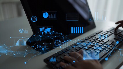 A close-up view of a laptop keyboard with dynamic data visualization overlays, illustrating the blend of technology and information analysis in a modern office atmosphere. Xenic
