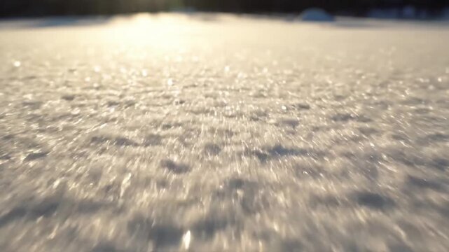 Dynamic Light Play snow sparkle winter Subtle camera movement (e.g., slow slider, push in, or pan) across sparkling snow, emphasizing