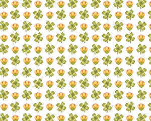 Green four-leaf clover and yellow flower seamless pattern