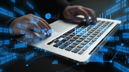 A close-up view of professional hands typing on a laptop, accompanied by visual elements representing digital data analysis and modern technology concepts used in various industries. Xenic