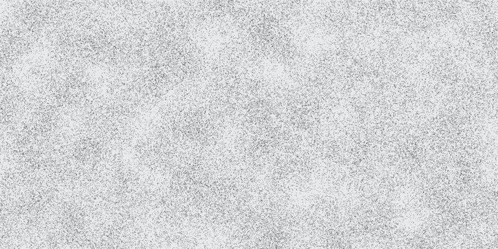Stippled gradient texture. Fading grain dotted background. Sprayed grunge noise surface. Vector art