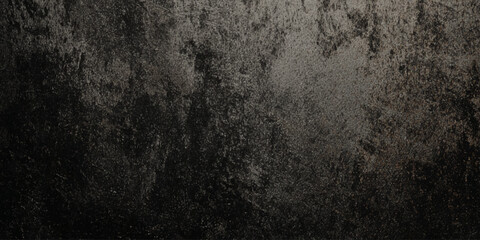 Obraz premium A dark textured surface presenting a mottled pattern of grays and blacks reminiscent of distressed concrete or aged metal