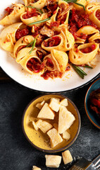 Classic traditional Italian pasta with fresh tomato marinara sauce.