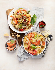 Delicious pastas with red shrimps and mussels, italian pastas, mediterranean recipe.