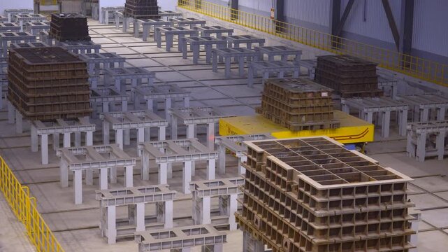 Industrial Factory Assembly Line with Precision Testing Equipment and Concrete Forms