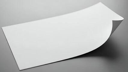 White Curved Sheet of Paper on Gray Surface