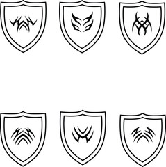 Fototapeta premium Set of tribal shield icons with abstract symbols and sharp geometric patterns for security branding and tattoo art design.
