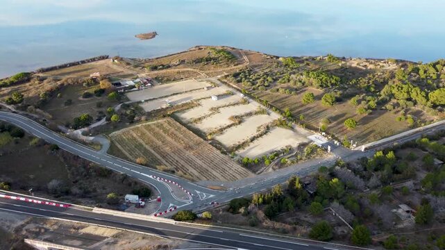 Drone footage of a camper van parking in the French coast. Empty in winter, low season.