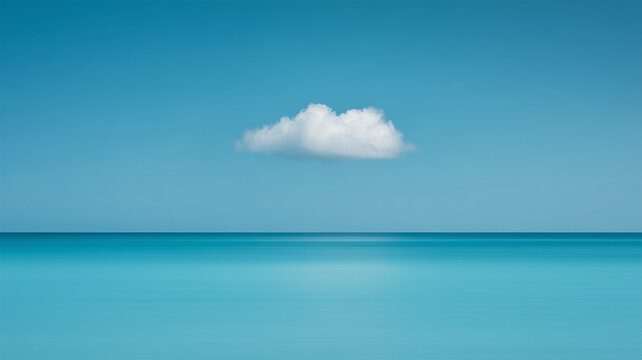 長時間露光のように滑らかな海と一雲だけの昼のミニマル風景