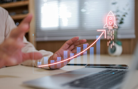 Businessman show icons about business and investment, rocket launch with arrow up percentage, Wealth fast, Graph depicting rising earning, increasing profits exemplifies financial success.