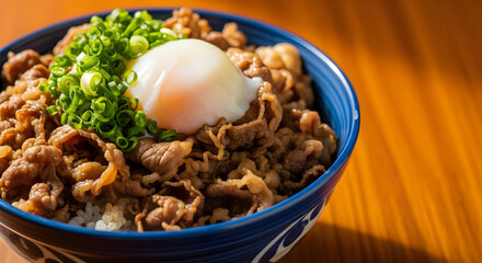 Delicious Gyudon Bowl with Onsen Egg and Scallions - A Japanese Culinary Delight.