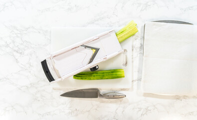 Using Mandoline to Slice Cucumber