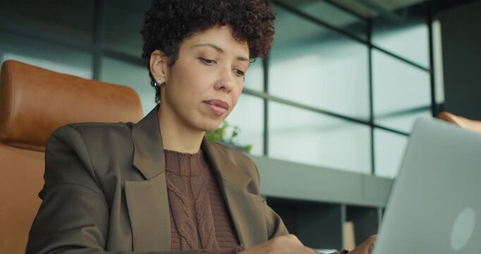 Top executive concentrating on strategic proposal in bright workspace