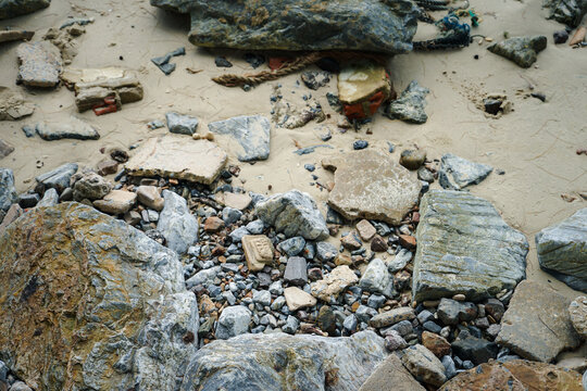 Trendy colorful small sea stone pebble background. Multicolored abstract beach nature pattern 
