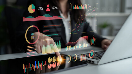 Modern business analytics interface showcases graphs and data visualizations with a professional interacting through touch, capturing attention and insight. Impute