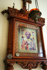 Signs of Serbian orthodox religious glory: candle, grain, Slavic cake, wine, icon of St. Nicholas