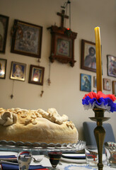Signs of Serbian orthodox religious glory: candle, grain, Slavic cake, wine, icon of St. Nicholas