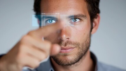 A man interacts with advanced facial recognition technology. His intense focus highlights the innovation and precision of this system in a clean, simple background - Powered by Adobe