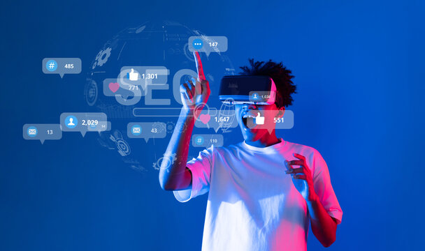 A person wearing virtual reality equipment engages with social media metrics and analytics, exploring digital strategies to enhance audience interaction and content ranking. XDMCP - Powered by Adobe