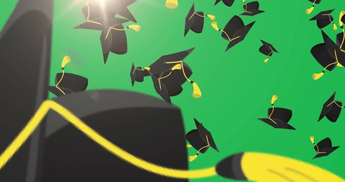 Animation of graduations hats falling against beige background