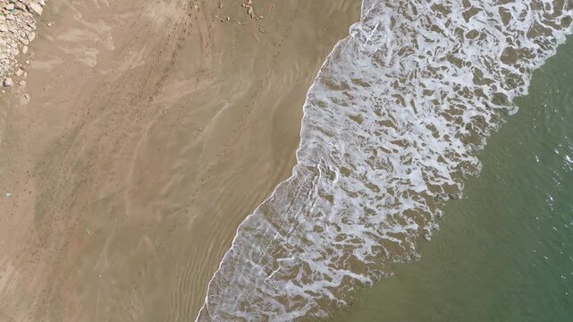 Sea Waves and Natural Coastal Beauty,A stunning Ariel shots capturing the blue waves of Karachi sea, showcasing the natural beauty and calmness of Pakistan&rsquo;s coastal region.