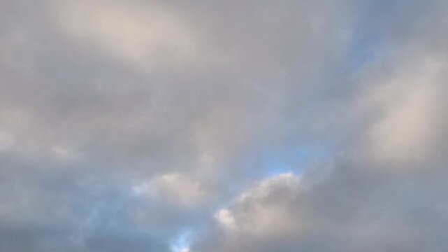 Beautiful scene of the sky filled with orange altocumulus clouds