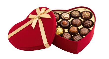 Red heart shaped box with assorted chocolates and gold ribbon on black background chocolate box truffles