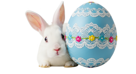 White bunny rabbit peeking from behind a blue Easter egg decorated with white lace and colorful flowers