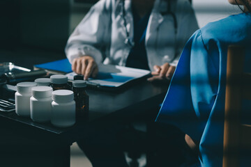 Male doctors shake hands with patients encouraging each other and praying for blessings. To offer love, concern, and encouragement while checking the patient's health. concept of medicine
