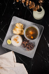 Traditional Indonesian Breakfast on Plate.