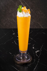 Tropical Orange Smoothie with Whipped Cream.