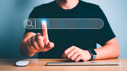 Man's finger touching a glowing search bar interface on a digital screen, representing online search and information discovery