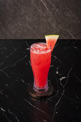 Watermelon Juice in Glass on Marble.