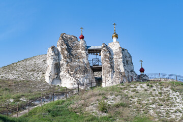 The bell tower of the ancient Kostomarovsky Spassky Convent on a sunny May day. Voronezh region, Russia
